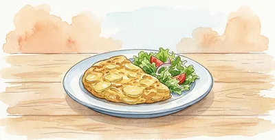 A plate with a slice of potato omelette and salad, on a wooden table.